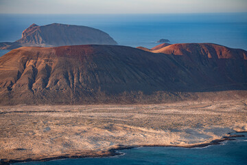 Fototapeta na wymiar Amazing volcanic landscape from above. Lanzarote, Canary Islands, Spain
