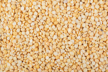 Large pile of dry, yellow lentil