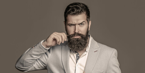 Male beard and mustache. Elegant man in business suit. Sexy male, brutal macho, hipster. Male in...