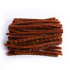 dried fish stick with pepper, snacks for beer isolated on white background