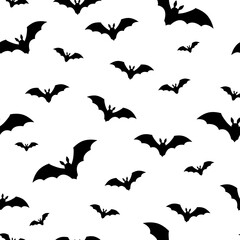 Naklejka premium Seamless pattern with bats. Flock of bats. Hand drawn vector illustration. Isolated objects on white background.