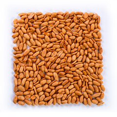 pile of spiced peanuts isolated close up on white background 