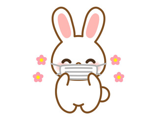 マスクをして感染症対策をするかわいい笑顔のウサギのイラスト素材