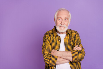 Photo portrait of concerned grandpa doubt not believe white hair wear trendy yellow plaid shirt isolated on lilac purple color background