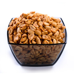 pile of spiced peanuts isolated close up on white background 