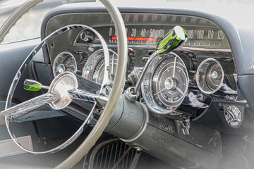 steering wheel, dashboard and insturment panel of an old time classic car