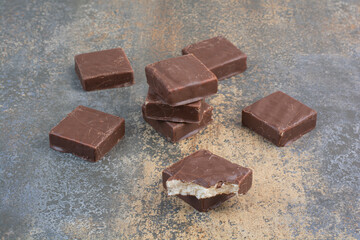 Bunch of milky chocolate on marble background
