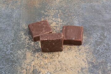 Bunch of milky chocolate on marble background