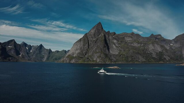 Fishing boat in the hamnoy Lofoten Islands, aerial footage