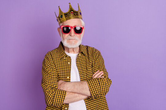 Photo of cool famous rich grandpa wear crown white hair dressed stylish yellow checkered shirt isolated on lilac violet color background