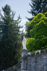 Statue near the Basilica of the Holy Rosary in Lourdes, France.