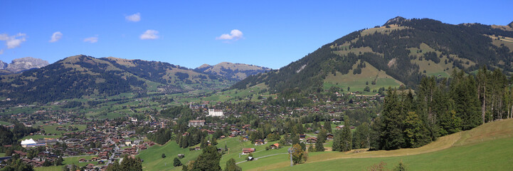 Fototapeta na wymiar Mountain village and holiday resort Gstaad in late summer.