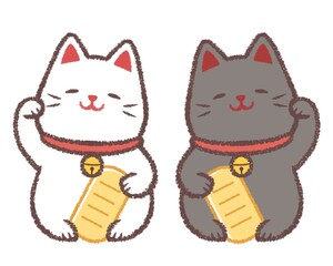 首をかしげるシロクロ招き猫のセット