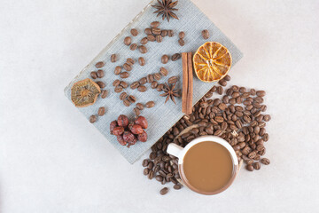A book with aroma tasty cup of coffee on white background