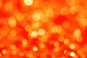 Abastract bokeh defocused lights red orange background.