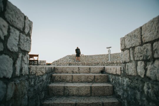 Tourist in the castle of Tesanj in Bosnia and Herzegovina