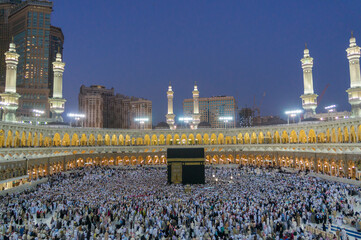 Muslim pilgrims circumambulate the Kaaba at sunset at Masjidil Haram in Makkah, Saudi Arabia....