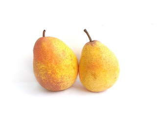 Delicious juicy yellow two pears close-up on a white background