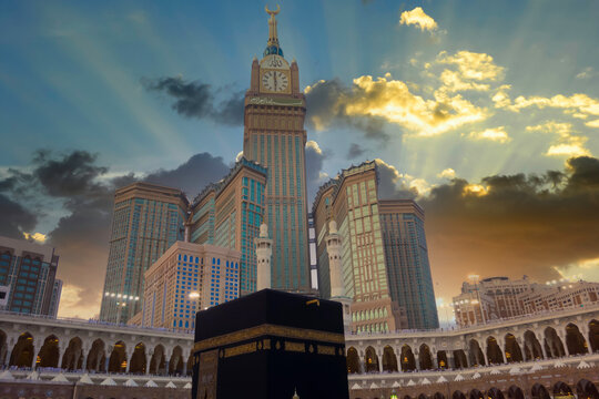 Holy kaaba with Abraj Al Bait (Royal Clock Tower Makkah) (left) in Makkah, Saudi Arabia. The tower is the tallest clock tower in the world at 601m (1972 feet), built at a cost of USD1.5 billion.
