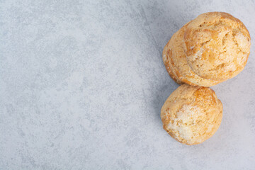 Stack of sweet cookies on gray background