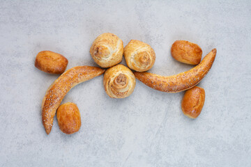 Variety of homemade biscuits on gray background