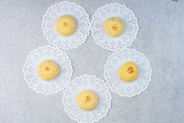 Tasty round cookies on gray background