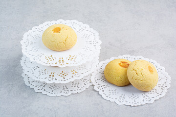 Stack of round cookies on gray background