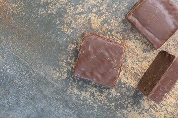 Bunch of milky chocolate on marble surface