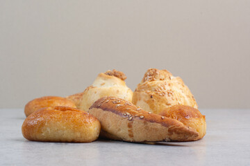 Variety of homemade biscuits on gray background