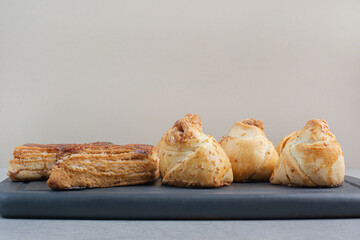 Bunch of homemade biscuits on dark plate