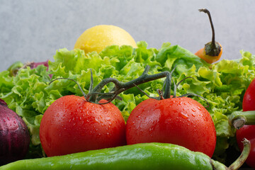 A lot of fresh vegetables on marble background