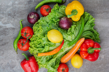 A lot of fresh vegetables on marble background - Powered by Adobe