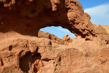Natural sandstone arch in the canyon Fairy Tale, Kyrgyzstan