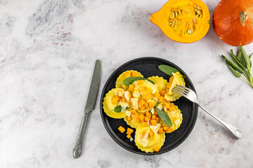 Seasonal autumn recipe. Pumpkin ravioli with sage, parmesan, and olive oil. Great meal for lunch or...