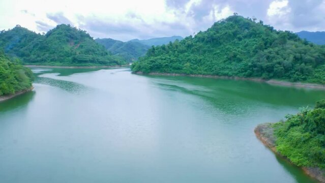 Beautiful Nature river natural landscape under blue sky, Aerial view of lake and green mountain, View on the lake between mountain forest, Timelaps, BCG concept.