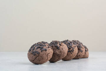 Sweet chocolate round cookies on white background