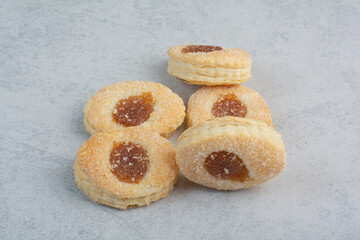 Some of round fresh delicious cookies on white background