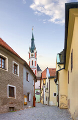 Beautiful view of small the Kostelni street and St. Vitus Cathedral. Cesky Krumlov, Czech Republic