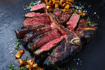 Traditional barbecue dry aged wagyu porterhouse beef steak bistecca alla Fiorentina with...