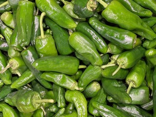 Green fresh bell peppers vegetables background.