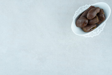 Homemade pickled eggplants in white bowl