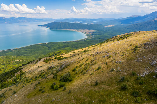 Aerial view of Ohrid-Prespa Transboundary Biosphere Reserve in National Park Galicica in North Macedonia of hill above Prespa lake