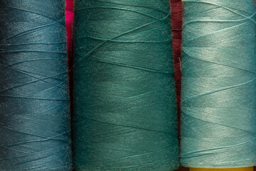 Spools of thread for a sewing machine