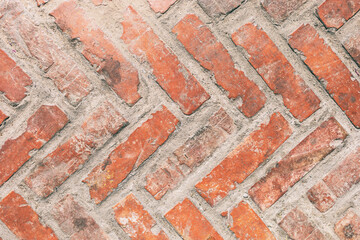 old stained red brick wall background close up
