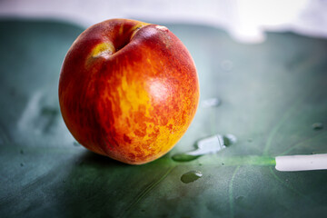 red apple on a wooden table