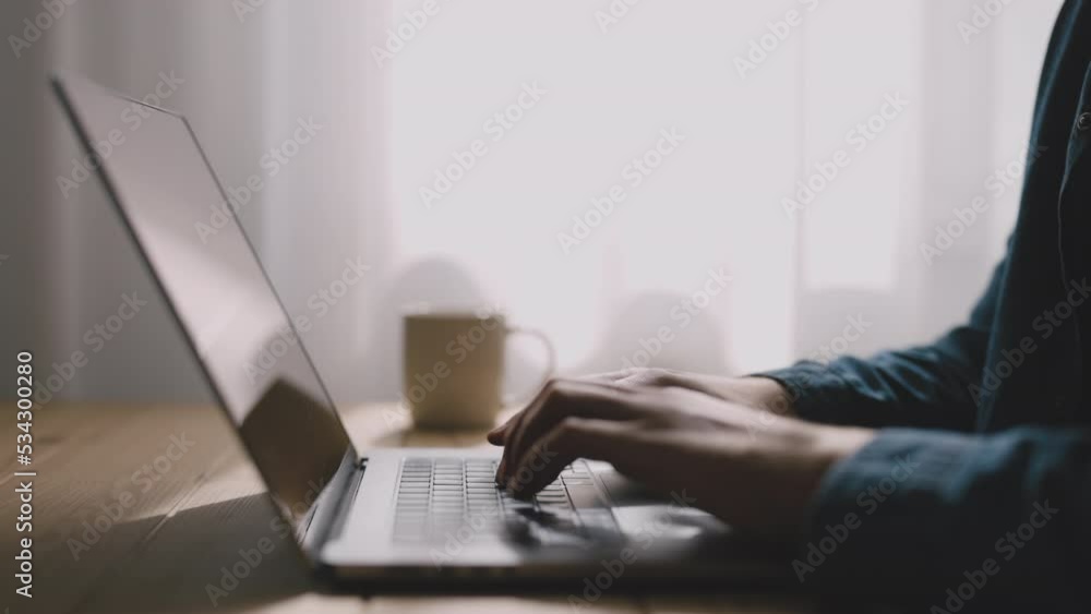 Poster close up view of coder hands writing code at home workplace