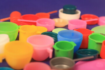 toys pans cups on blue background