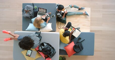 Creative students working on multimedia technology on sofa or lounge at university, college or school. Diversity gen z creativity, digital marketing or graphic design internship people on couch - Powered by Adobe