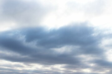 Naklejka na ściany i meble A gloomy sky with gray clouds.