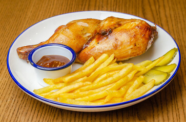 French fries with chicken leg and sauce